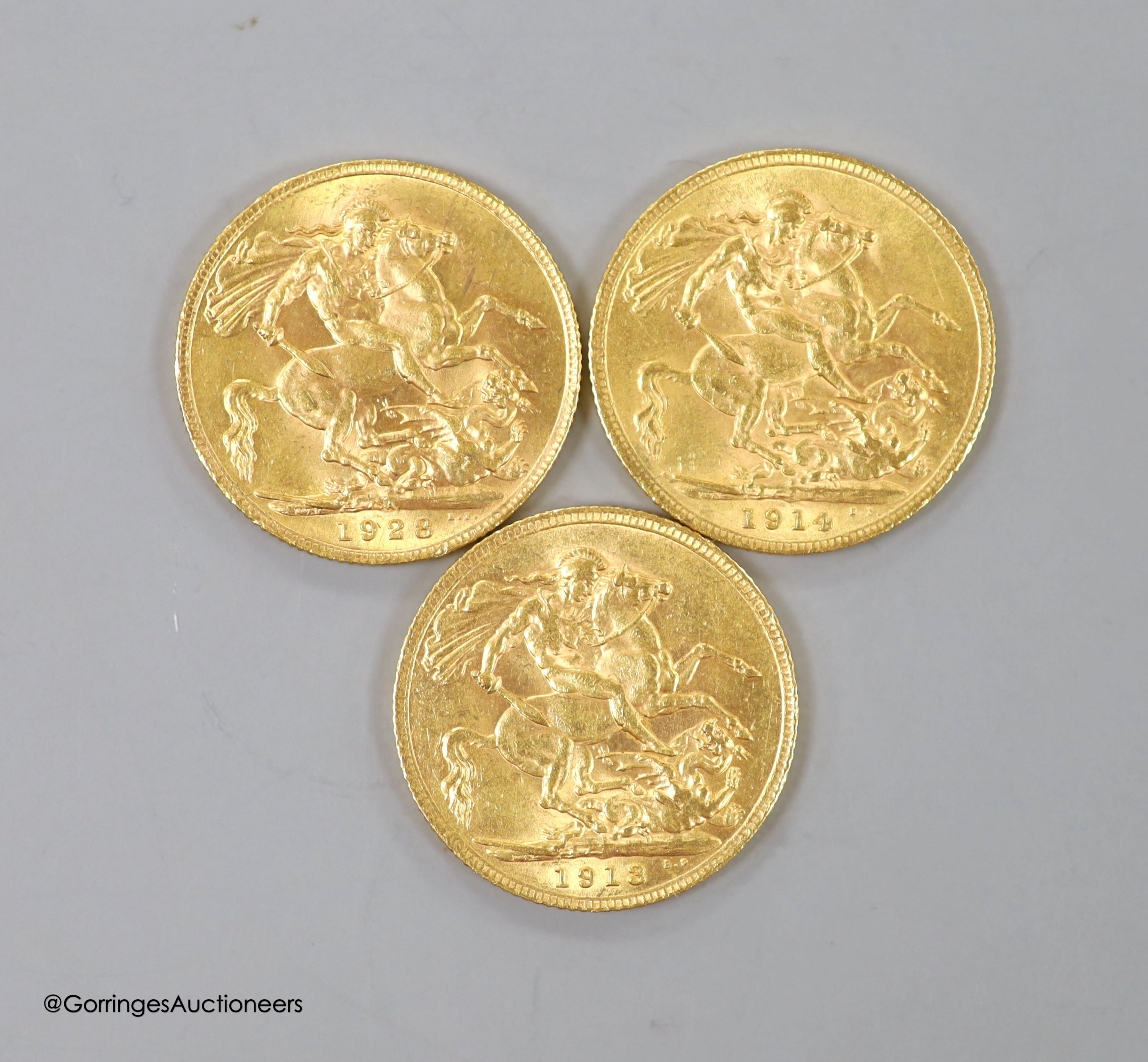 Three George V gold sovereigns, 1913, 1914 and 1928SA